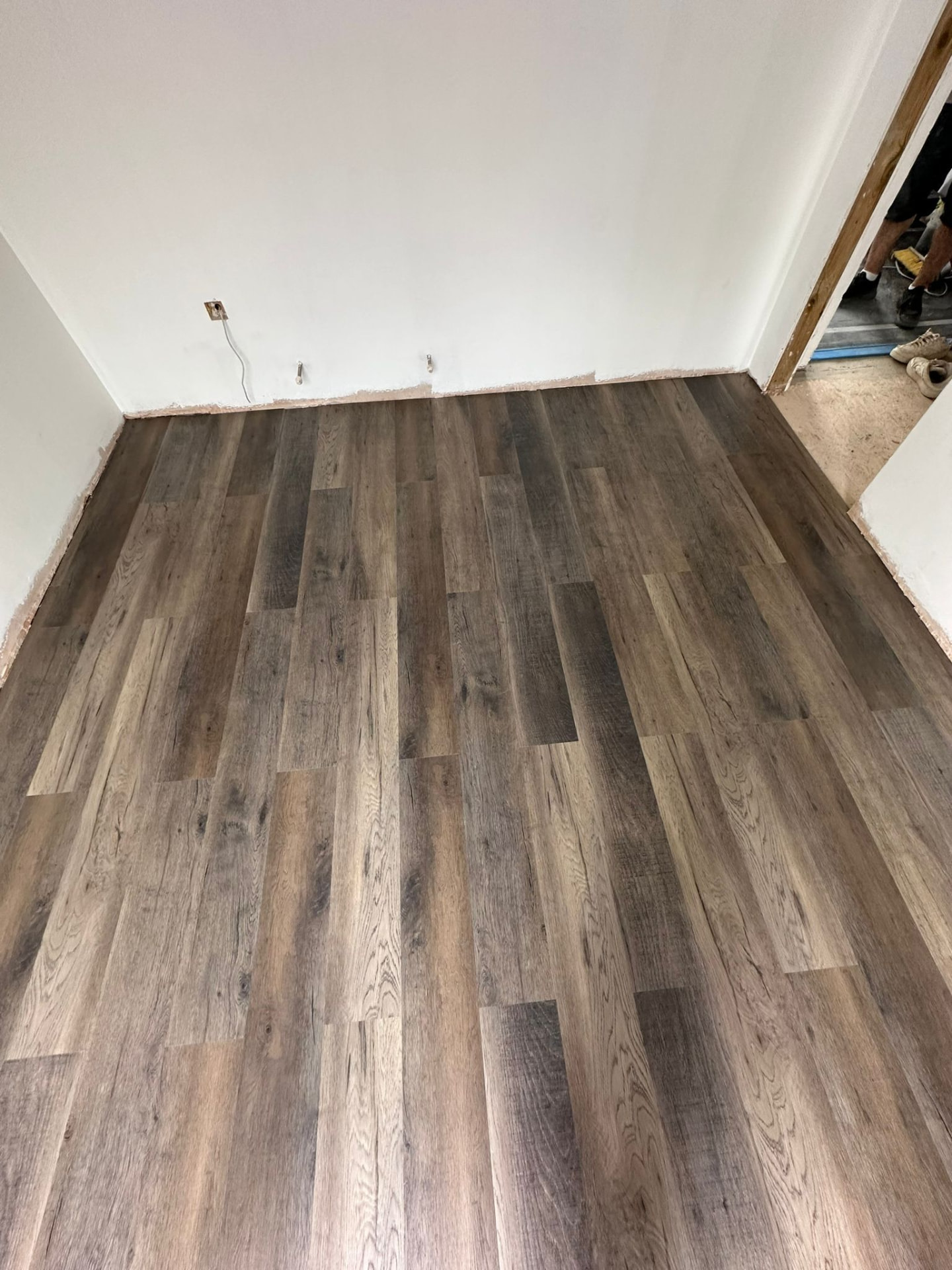 Wood-effect plank flooring fitted in one of the new bedrooms